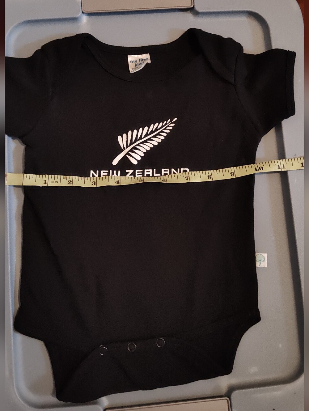 New Zealand Black Baby Bodysuit with Silver Fern Size 12-24m. 100% Cotton.